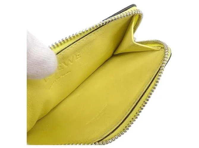 Loewe Estuche para tarjetas de charol con anagrama en muy buen estado Amarillo 