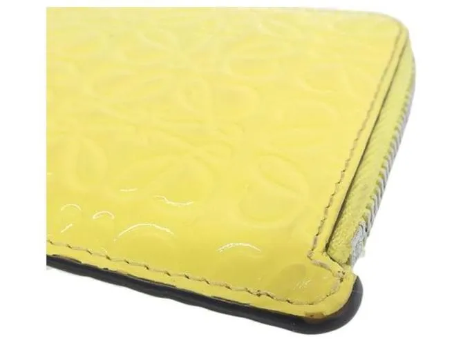 Loewe Estuche para tarjetas de charol con anagrama en muy buen estado Amarillo 