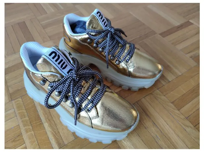 MIU MIU SNEAKERS MAXI SUELA GRANDE ORO Dorado 